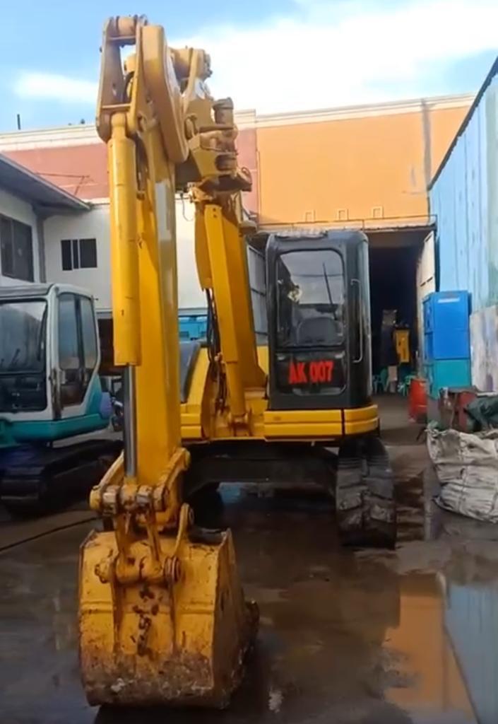 sewa excavator per jam surabaya