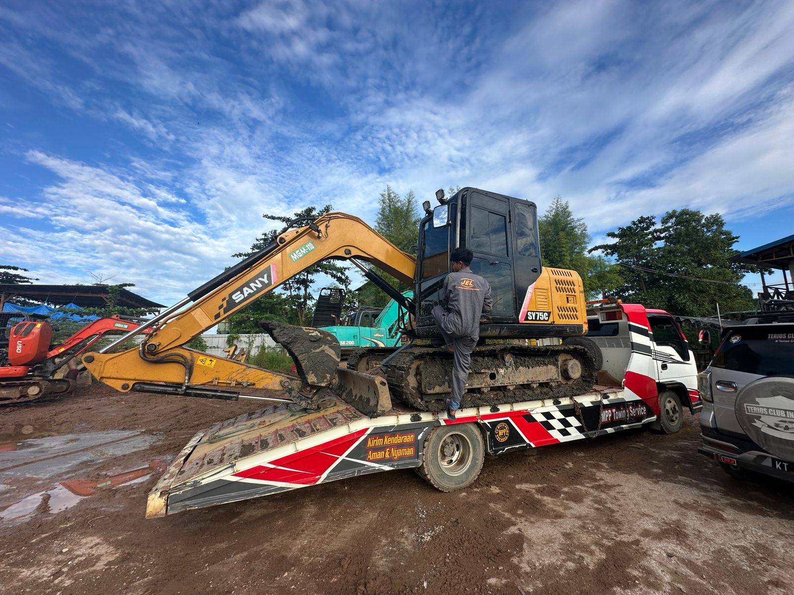 sewa excavator per jam